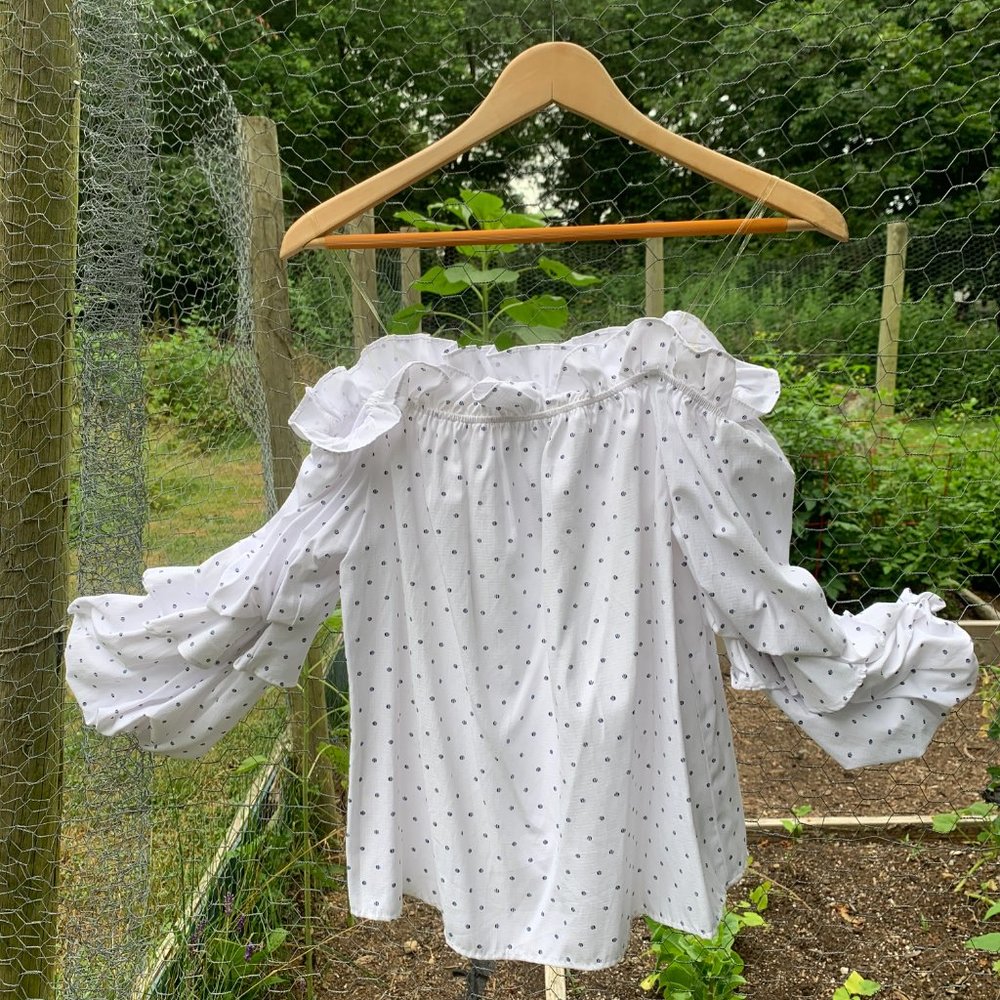 Off shoulder blouse with ruffled sleeves
